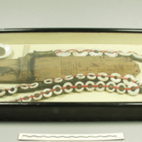 Ifugao wooden sheath with shell rings 