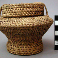 Basket, with lid, carinated body, pedestal base, wrapped loop closures