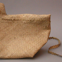Bird shaped basket for holding seed