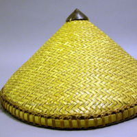 Woven hat of cross-hatched bamboo strips with nut form finial