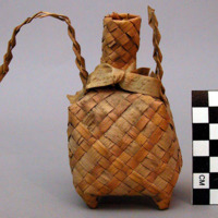 Woven basketry dance favor - square, bottle-shaped with ribbon bow