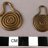 Pair of brass earrings