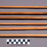 Arrow, wood point inserted into reed shaft, fiber wraps