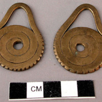 Pair of brass earrings