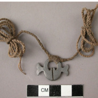 Neck ornament with lead pendant
