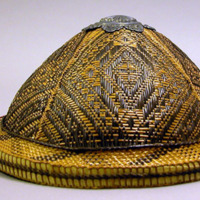 Woven bamboo strip hat with silver finial
