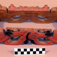 Stand for canoe model, rectangular, carved curvilinear and pigmented designs