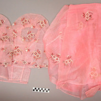 Skirt, part of  a three piece outfit, long skirt, open weave, pink, embroidered with brown, white floral designs