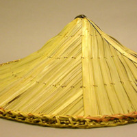 Hat of plantain leaves, bamboo finial